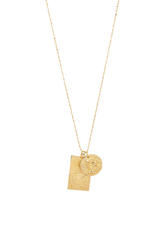 Front view of Spell’s Aquarius Stargazer Zodiac Necklace. The double embossed pendant charm necklace comes in 22k Gold Vermeil and hangs from a twisted rope chain.