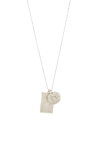 Front view of Spell’s Aquarius Stargazer Zodiac Necklace. The double embossed pendant charm necklace comes in 0.925 Sterling Silver and hangs from a twisted rope chain.